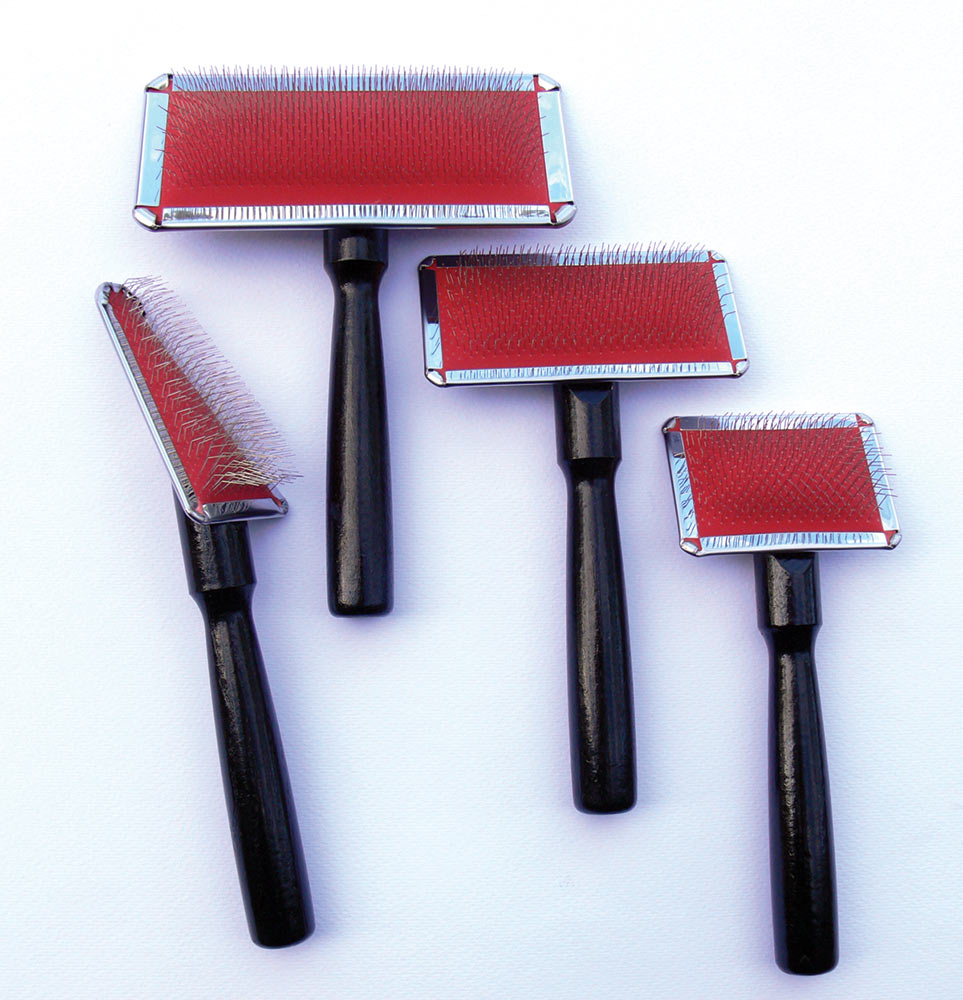 Dog slicker brushes.